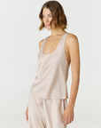 Discover luxury with the Anaiis Silk Tank in champagne cream from AOCO. Crafted from premium silk, this chic and versatile camisole offers a flawless drape for any occasion. And Racerback feature.