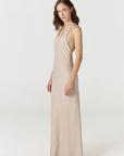 Embrace pure elegance with the Bella Silk Dress by AOCO. Made from luxurious silk, this slip dress offers a flawless silhouette for your glamorous evenings.