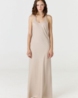 Embrace pure elegance with the Bella Silk Dress by AOCO. Made from luxurious silk, this slip dress offers a flawless silhouette for your glamorous evenings.