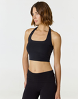 Refresh your summer wardrobe with the Mia Cropped Halter from AOCO. Featuring a chic halter neckline and a flattering cropped fit, it's a warm weather must.