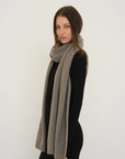 Stay warm with the Cashmere Wool Blend Scarf from AOCO. Crafted from ultra-soft fibers, this elegant accessory is an essential cold weather staple.