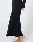 Soft, cosy floor-length skirt with a high waist and asymmetric hem, designed to create an elongating silhouette. A versatile and comfortable wardrobe essential, perfect for effortless day-to-night dressing.