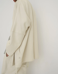 Wrap yourself in comfort with the French Terry Robe Jacket from AOCO. This versatile layer blends robe-like coziness with an everyday stylish jacket design.