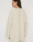 Wrap yourself in comfort with the French Terry Robe Jacket from AOCO. This versatile layer blends robe-like coziness with an everyday stylish jacket design.