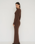 Embrace effortless style with the Long Sleeve Henley Maxi Dress from AOCO. Featuring a classic button front and soft fabrics, it's your new daily essential.