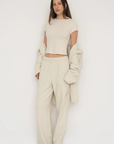 Upgrade your downtime with the French Terry Wide Leg Pants from AOCO in cream. Crafted from ultra-soft fabrics, these chic bottoms provide a flattering, relaxed fit.