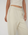 Upgrade your downtime with the French Terry Wide Leg Pants from AOCO in cream. Crafted from ultra-soft fabrics, these chic bottoms provide a flattering, relaxed fit.