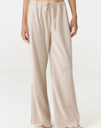Crafted in premium silk, these straight leg pants Champagne / light beige silk pants move with a fluid drape and understated structure. A considered staple that balances ease and refinement for effortless everyday dressing. Pair with the Anaiis Silk Tank for an elevated set.
