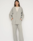 Wrap yourself in comfort with the French Terry Robe Jacket from AOCO. This versatile layer blends robe-like coziness with an everyday stylish jacket design.