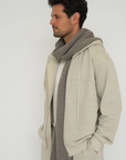 Stay warm with the Cashmere Wool Blend Scarf from AOCO. Crafted from ultra-soft fibers, this elegant accessory is an essential cold weather staple.