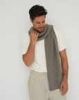Stay warm with the Cashmere Wool Blend Scarf from AOCO. Crafted from ultra-soft fibers, this elegant accessory is an essential cold weather staple.