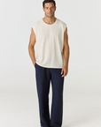 Discover the chic Paros Linen Jersey Tank Vest by AOCO. Crafted from a soft, lightweight linen blend, this sleeveless top delivers ultimate warm weather comfort.