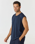 Discover the chic Paros Linen Jersey Tank Vest by AOCO. Crafted from a soft, lightweight linen blend, this sleeveless top delivers ultimate warm weather comfort.