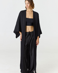 Relax in luxury with the Shura Kaftan from AOCO. This breezy, lightweight resort wear piece features an elegant, relaxed fit perfect for your next getaway.