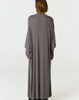 Relax in luxury with the Shura Kaftan from AOCO. This breezy, lightweight resort wear piece features an elegant, relaxed fit perfect for your next getaway.