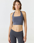 Refresh your summer wardrobe with the Mia Cropped Halter from AOCO. Featuring a chic halter neckline and a flattering cropped fit, it's a warm weather must.
