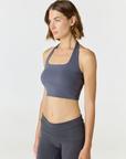 Refresh your summer wardrobe with the Mia Cropped Halter from AOCO. Featuring a chic halter neckline and a flattering cropped fit, it's a warm weather must.