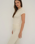 Soft organic cotton fold over leggings in cream with a comfortable fold over waistband.