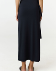 Step into summer with the flowy Soleil Wrap Skirt from AOCO. Featuring a lightweight fabric and an adjustable waist, this piece delivers effortless comfort.