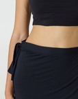 Step into summer with the flowy Soleil Wrap Skirt from AOCO. Featuring a lightweight fabric and an adjustable waist, this piece delivers effortless comfort.