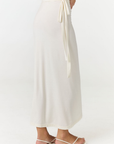 Step into summer with the flowy Soleil Wrap Skirt from AOCO. Featuring a lightweight fabric and an adjustable waist, this piece delivers effortless comfort.