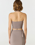 Refresh your summer wardrobe with the Mia Cropped Halter from AOCO. Featuring a chic halter neckline and a flattering cropped fit, it's a warm weather must.