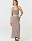 Refresh your summer wardrobe with the Mia Cropped Halter from AOCO. Featuring a chic halter neckline and a flattering cropped fit, it's a warm weather must.