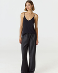Upgrade your warm weather wardrobe with the Willow Knit Tank from AOCO. Crafted for breathable comfort, this versatile sleeveless top brings effortless style.