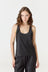 Discover luxury with the Anaiis Silk Tank from AOCO. Crafted from premium silk, this chic and versatile camisole offers a flawless drape for any occasion. And Racerback feature.