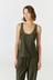 Discover luxury with the Anaiis Silk Tank in olive from AOCO. Crafted from premium silk, this chic and versatile camisole offers a flawless drape for any occasion. And Racerback feature.
