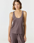 Discover luxury with the Anaiis Silk Tank from AOCO. Crafted from premium silk, this chic and versatile camisole offers a flawless drape for any occasion. And Racerback feature.