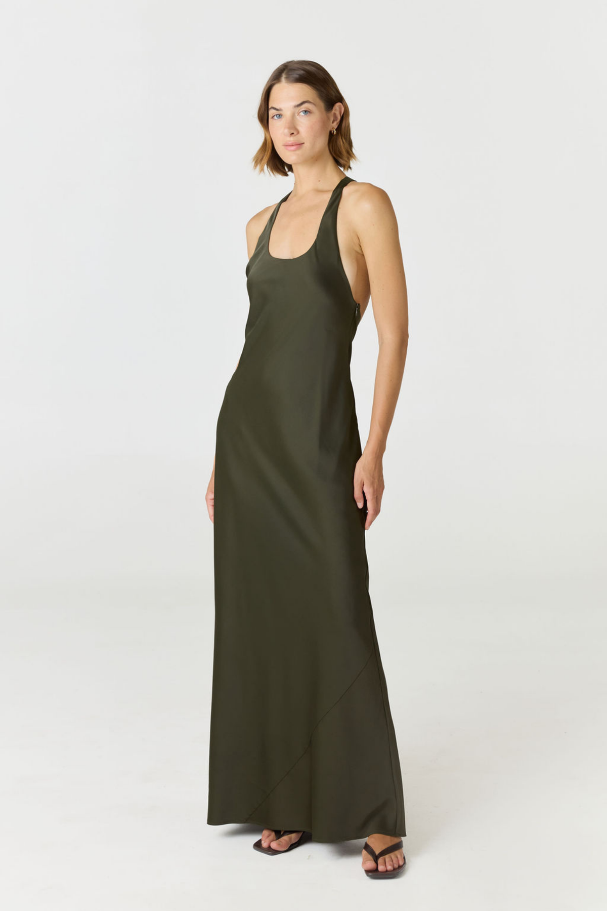 Embrace pure elegance with the Bella Silk Dress by AOCO. Made from luxurious silk, this slip dress offers a flawless silhouette for your glamorous evenings.