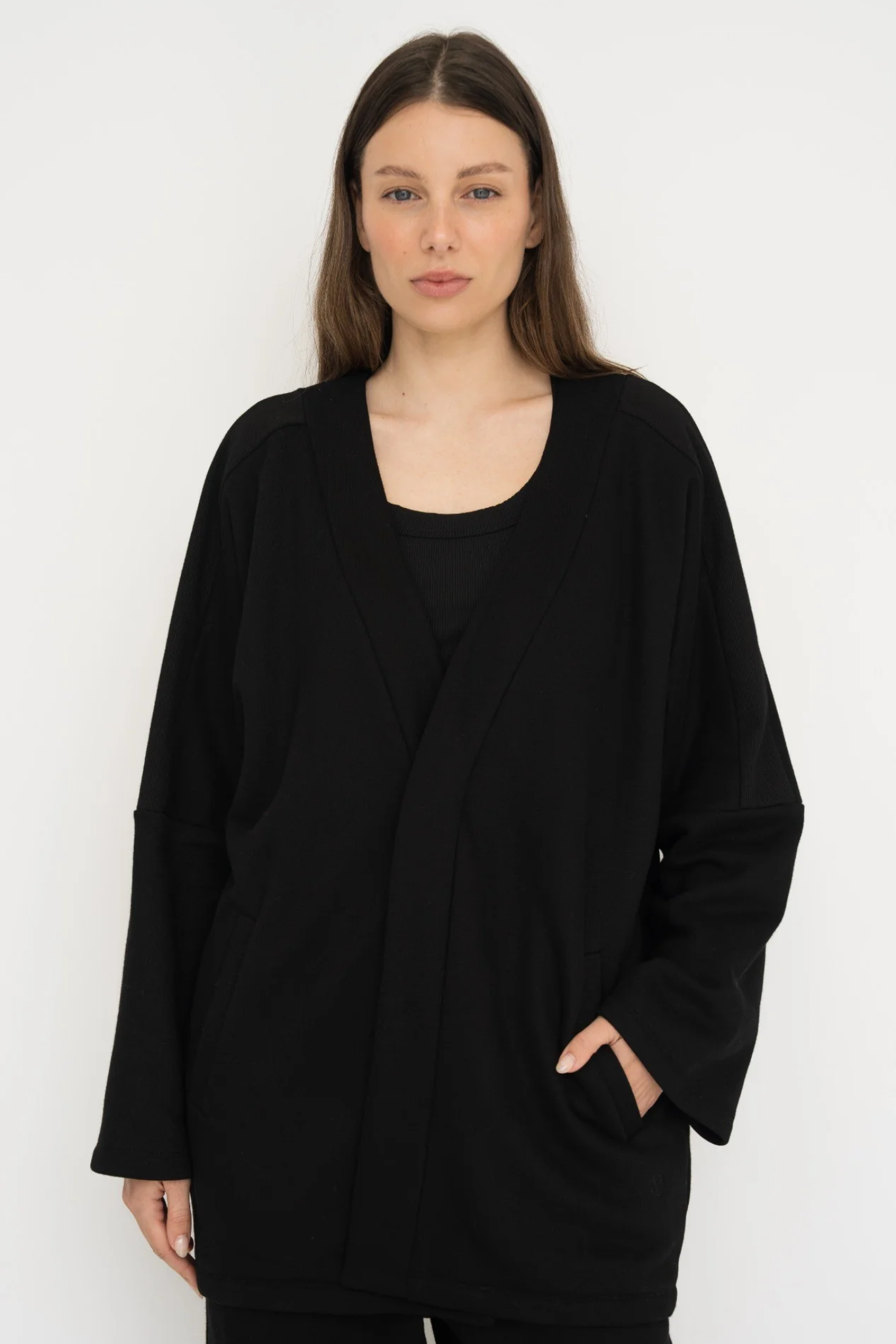 Wrap yourself in comfort with the French Terry Robe Jacket from AOCO. This versatile layer blends robe-like coziness with an everyday stylish jacket design.