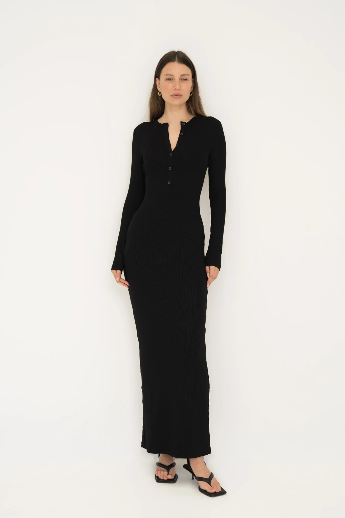 Embrace effortless style with the Long Sleeve Henley Maxi Dress from AOCO. Featuring a classic button front and soft fabrics, it's your new daily essential.