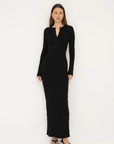 Embrace effortless style with the Long Sleeve Henley Maxi Dress from AOCO. Featuring a classic button front and soft fabrics, it's your new daily essential.