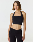 Refresh your summer wardrobe with the Mia Cropped Halter from AOCO. Featuring a chic halter neckline and a flattering cropped fit, it's a warm weather must.