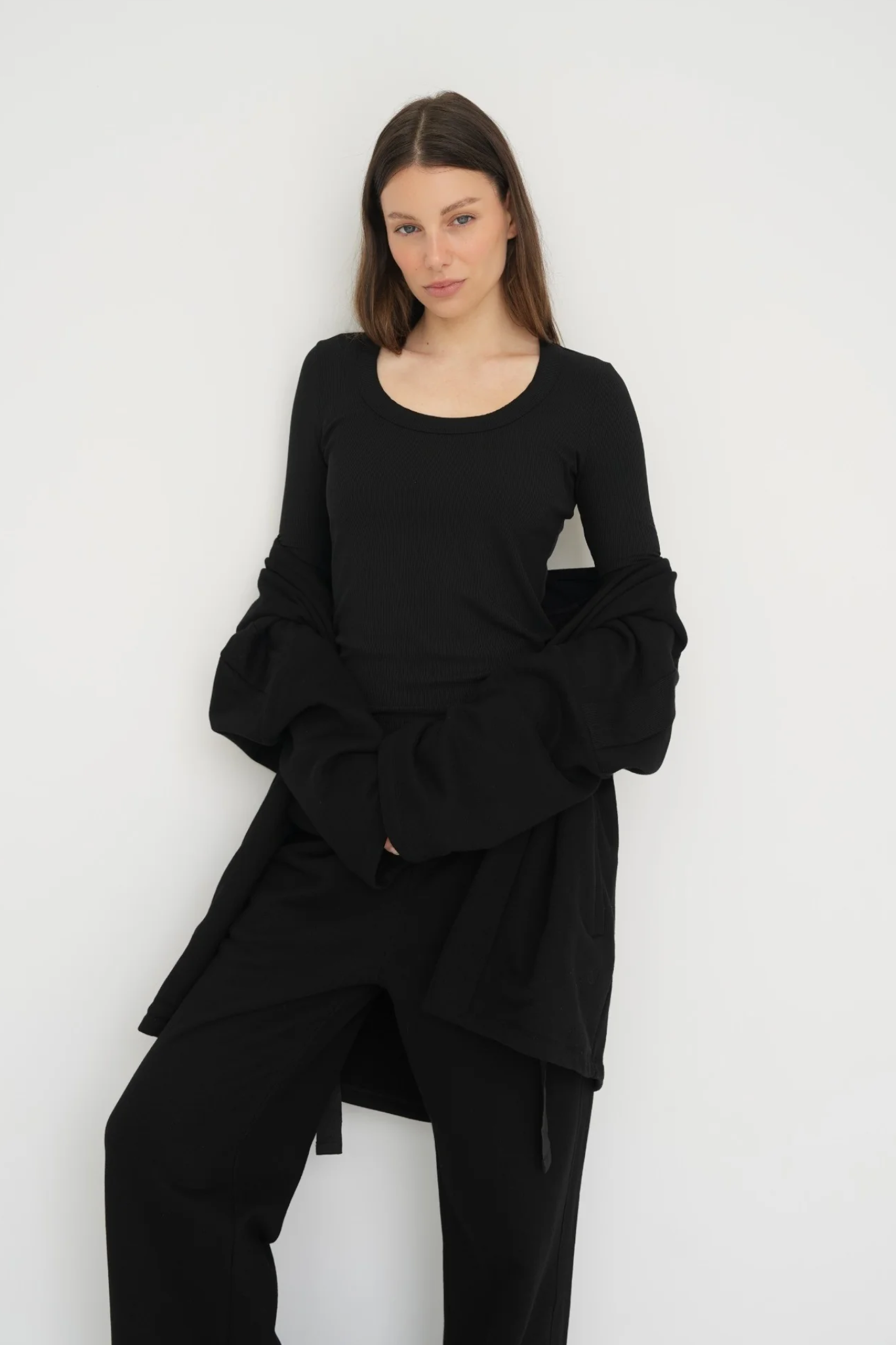 Upgrade your basics with the Long Sleeve Fitted Scoop Neck Top by AOCO. Made from soft, stretchy fabric, this flattering silhouette is a daily essential.