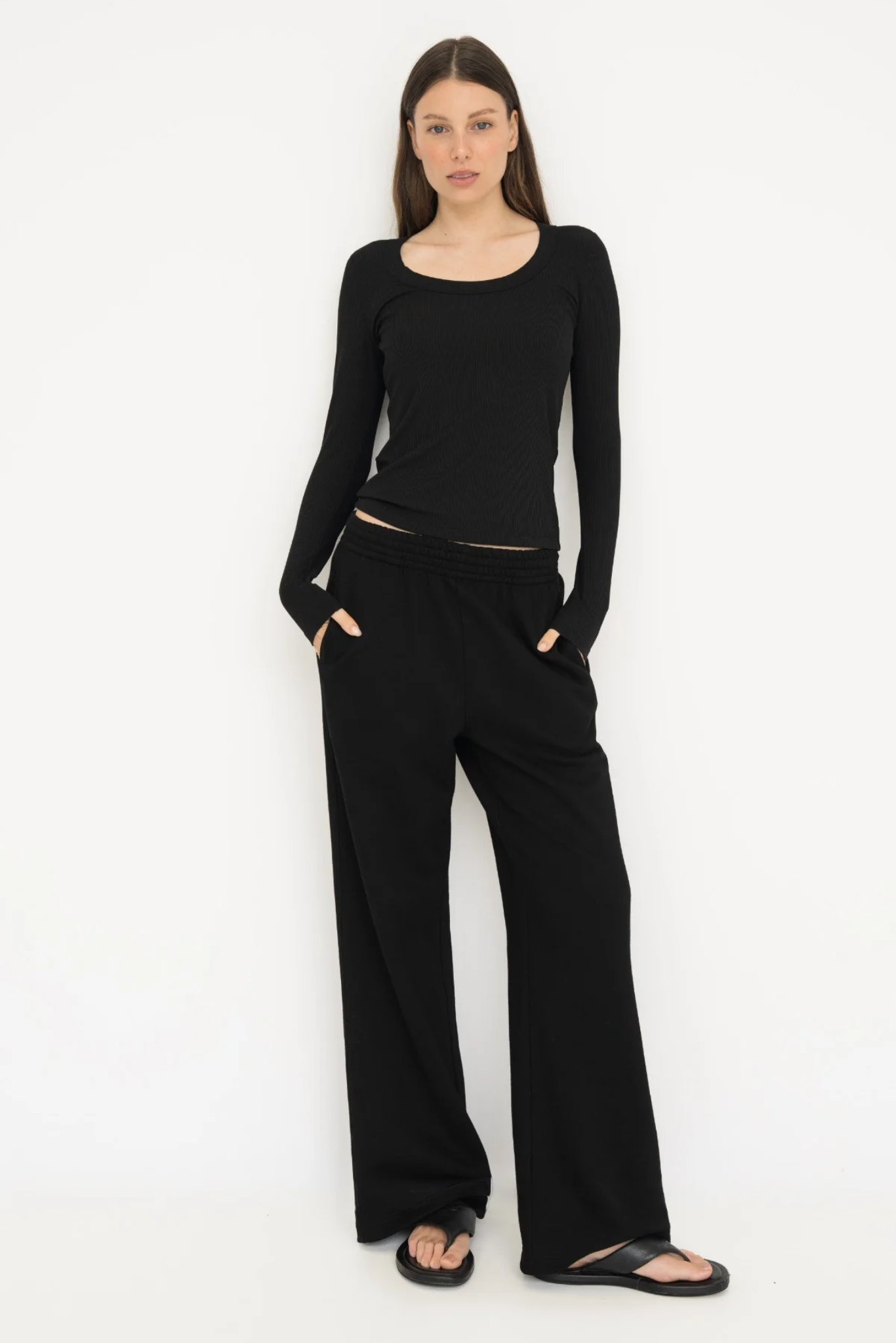 Upgrade your basics with the Long Sleeve Fitted Scoop Neck Top by AOCO. Made from soft, stretchy fabric, this flattering silhouette is a daily essential.