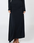 Soft, cosy floor-length skirt with a high waist and asymmetric hem, designed to create an elongating silhouette. A versatile and comfortable wardrobe essential, perfect for effortless day-to-night dressing.