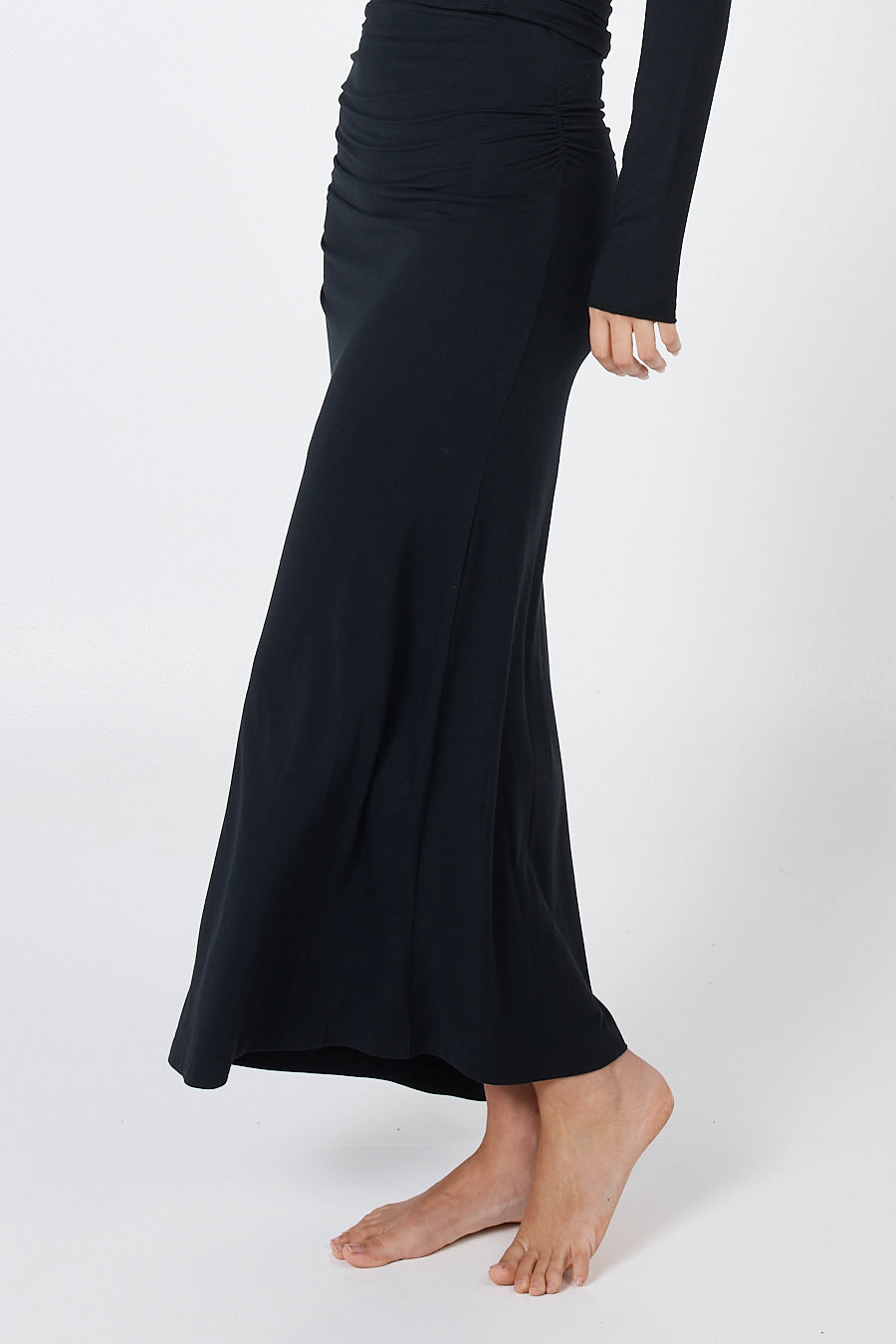 Soft, cosy floor-length skirt with a high waist and asymmetric hem, designed to create an elongating silhouette. A versatile and comfortable wardrobe essential, perfect for effortless day-to-night dressing.