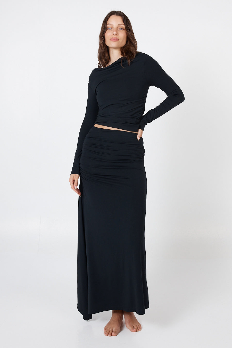 Soft, cosy floor-length skirt with a high waist and asymmetric hem, designed to create an elongating silhouette. A versatile and comfortable wardrobe essential, perfect for effortless day-to-night dressing.