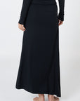Soft, cosy floor-length skirt with a high waist and asymmetric hem, designed to create an elongating silhouette. A versatile and comfortable wardrobe essential, perfect for effortless day-to-night dressing.
