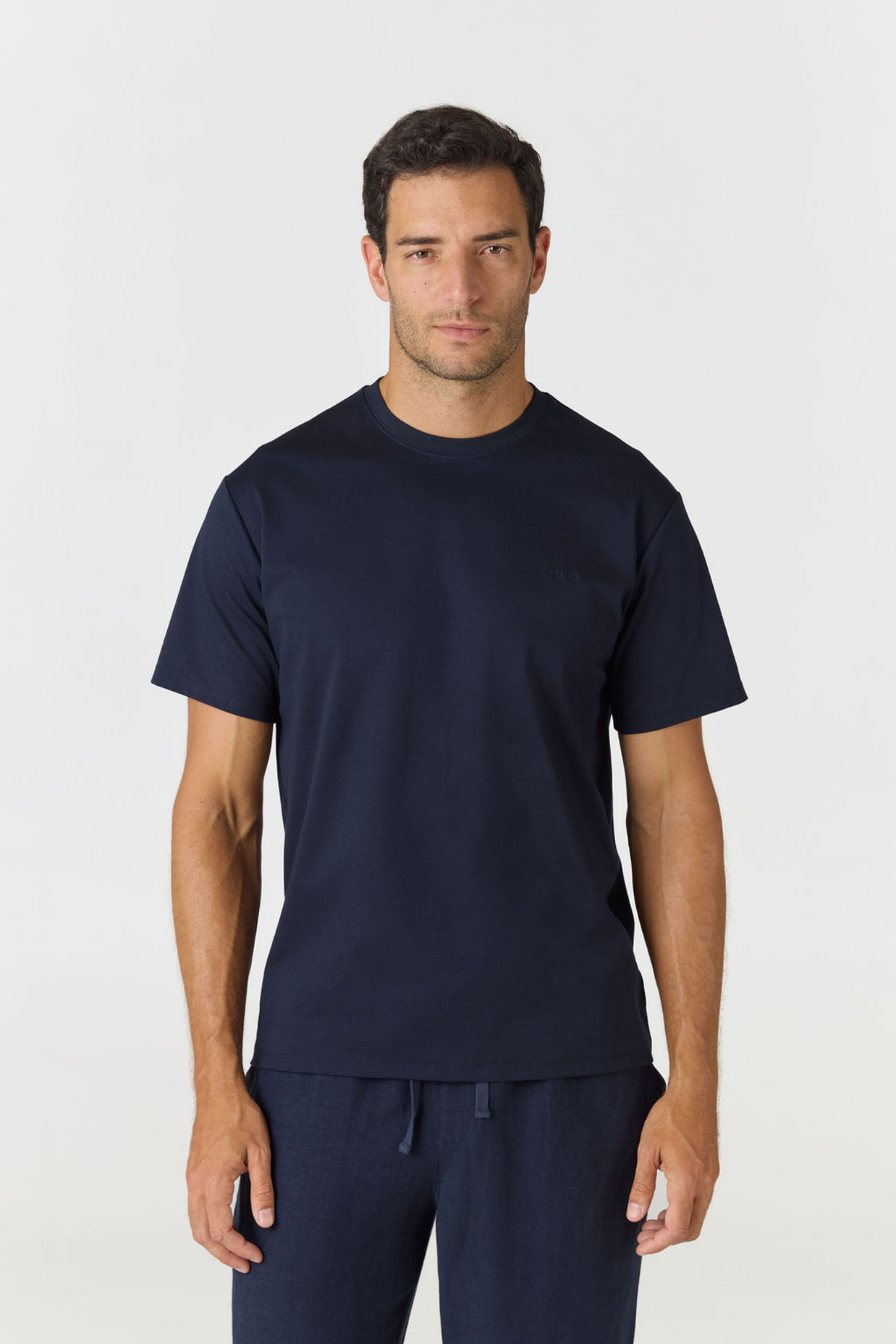 Elevate your everyday basics with the Logo Embroidered Cotton T-shirt from AOCO. Made from premium, breathable cotton, it features a timeless minimalist logo.