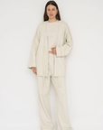 Wrap yourself in comfort with the French Terry Robe Jacket from AOCO. This versatile layer blends robe-like coziness with an everyday stylish jacket design.