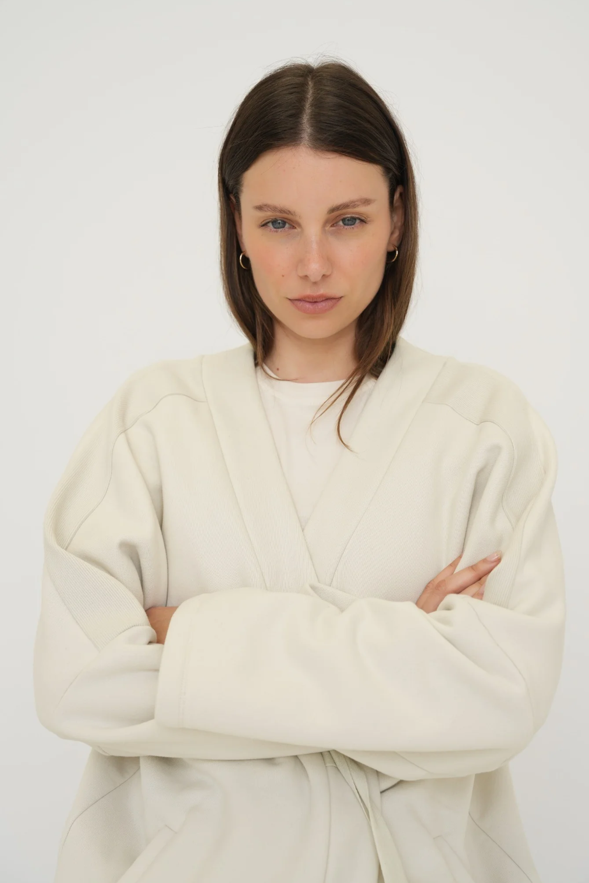 Wrap yourself in comfort with the French Terry Robe Jacket from AOCO. This versatile layer blends robe-like coziness with an everyday stylish jacket design.