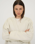 Wrap yourself in comfort with the French Terry Robe Jacket from AOCO. This versatile layer blends robe-like coziness with an everyday stylish jacket design.