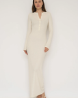 Embrace effortless style with the Long Sleeve Henley Maxi Dress from AOCO. Featuring a classic button front and soft fabrics, it's your new daily essential.