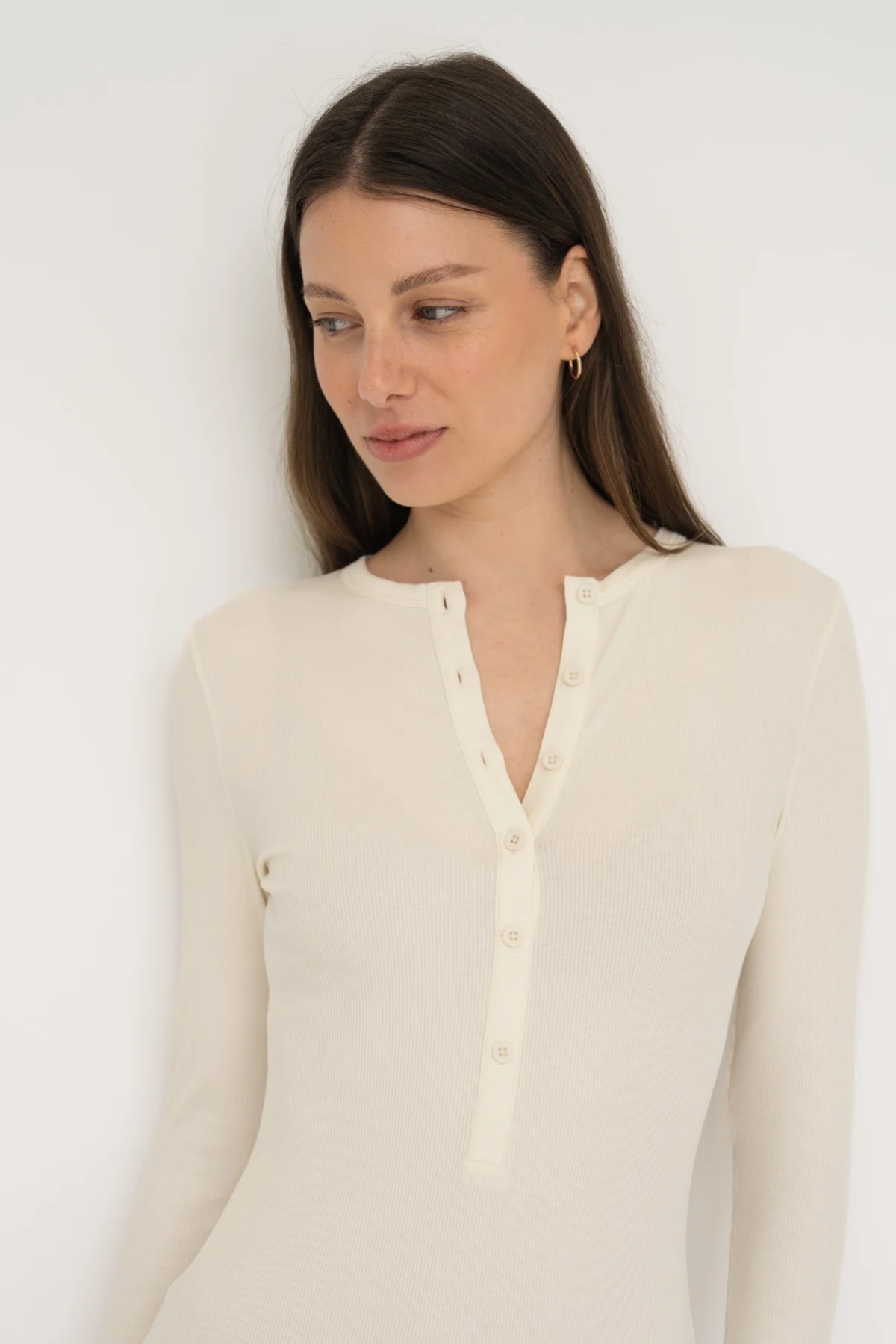 Embrace effortless style with the Long Sleeve Henley Maxi Dress from AOCO. Featuring a classic button front and soft fabrics, it's your new daily essential.