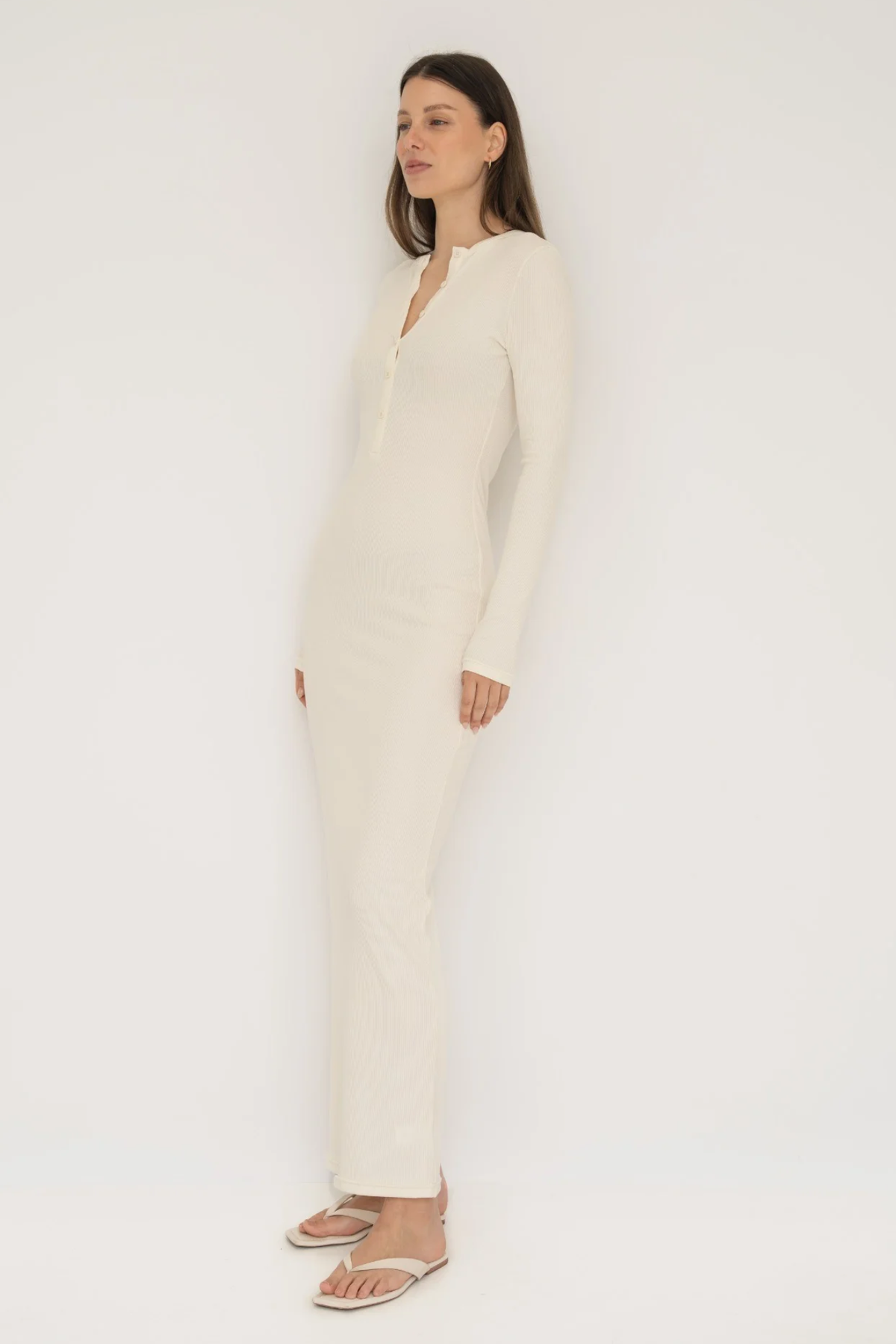 Embrace effortless style with the Long Sleeve Henley Maxi Dress from AOCO. Featuring a classic button front and soft fabrics, it's your new daily essential.