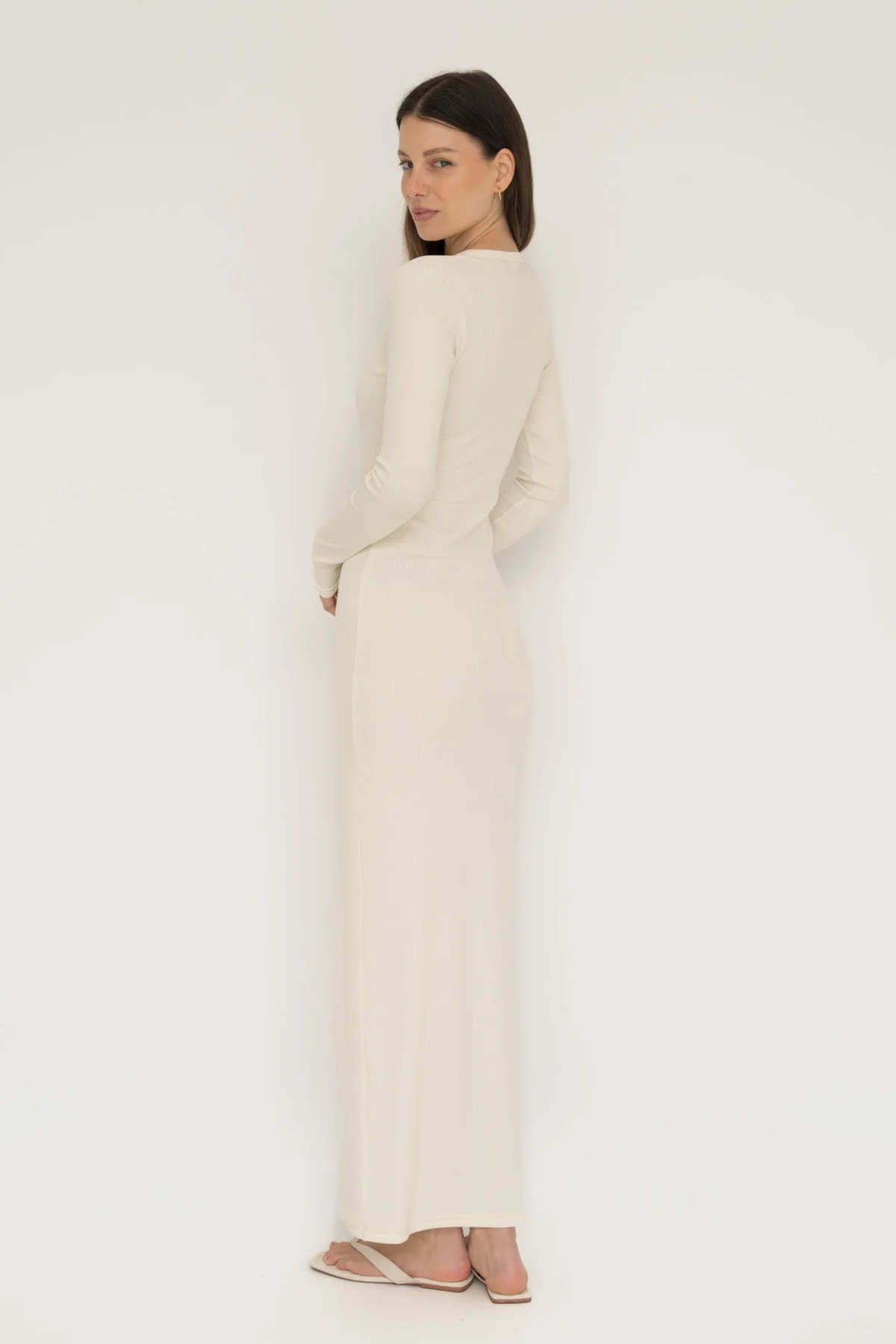 Embrace effortless style with the Long Sleeve Henley Maxi Dress from AOCO. Featuring a classic button front and soft fabrics, it's your new daily essential.